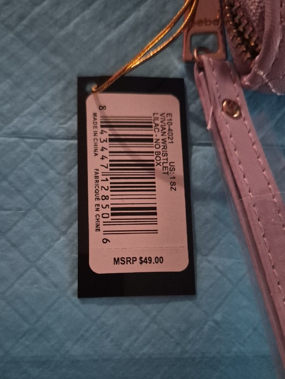 bebe Quilted Wristlet in Purple      Lilac with Gold Logo - Picture 6 of 6